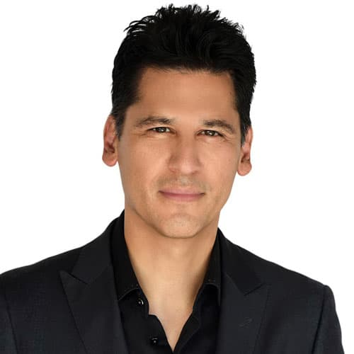 Joshua Briones, CEO and Founder of Briones PC, in a professional suit, conveying confidence and determination, relevant to his role in class action defense and legal expertise.